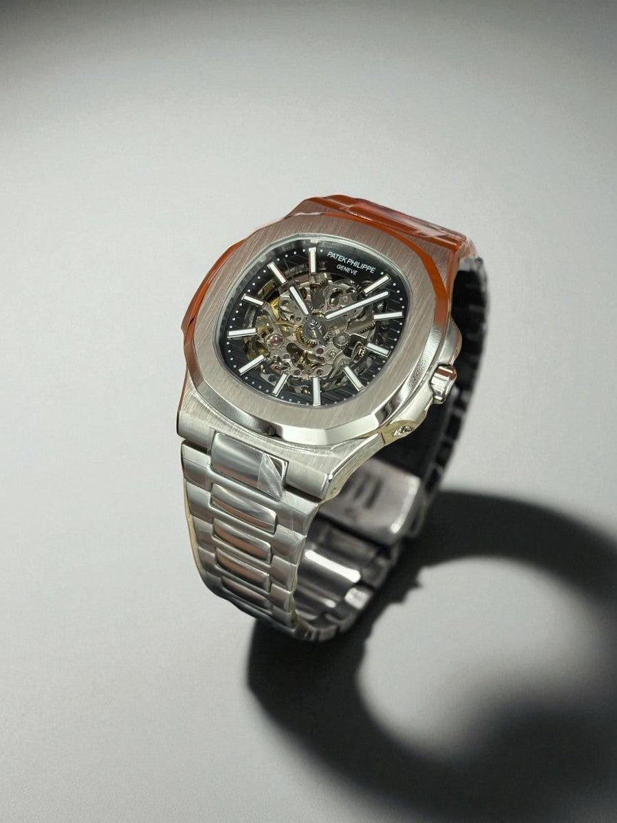 Patek Philippe Nautilus Skeleton – Açık Mekanizmalı Gümüş Kasa ve Bilezik
