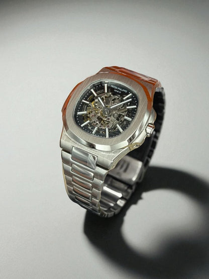 Patek Philippe Nautilus Skeleton – Açık Mekanizmalı Gümüş Kasa ve Bilezik